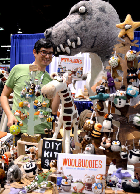 Woolbuddy founder and needle felting artist showing wool felt characters